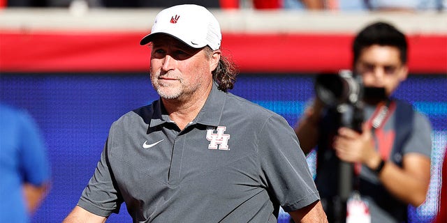 Dana Holgorsen coaches the Houston Cougars