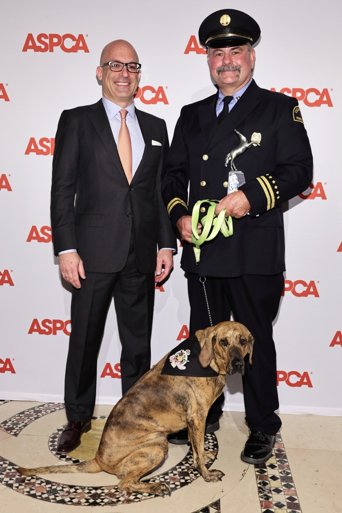 ASPCA President and CEO Matt Bershadker, Captain Robert Moree and Clementine the Dog attend the 2022 ASPCA Humane Awards Luncheon.