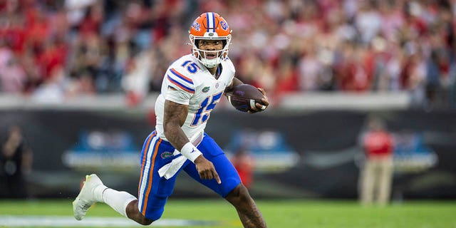 Anthony Richardson of the Gators runs for yardage against the Georgia Bulldogs at TIAA Bank Field on Oct. 29, 2022, in Jacksonville, Florida.