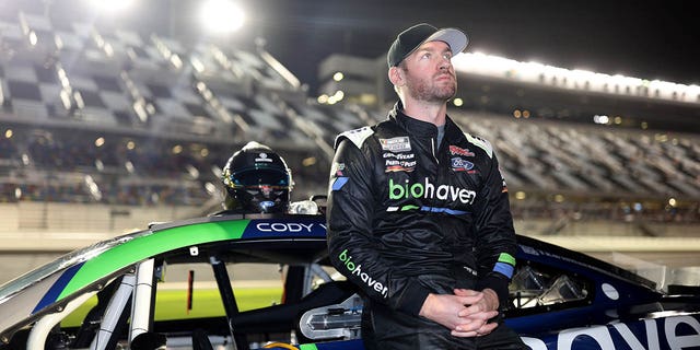 Cody Ware, driver of the #51 Biohaven/Jacob Co. Ford, looks on during qualifying for the Busch Light Pole at Daytona International Speedway on February 15, 2023 in Daytona Beach, Florida. 