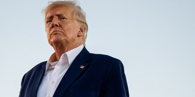 Former President Donald Trump looks on during a rally at the Waco Regional Airport on March 25, 2023, in Waco, Texas. 