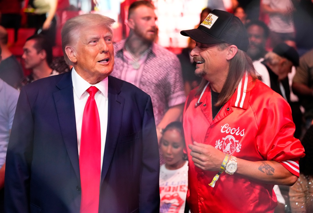 Former U.S. President Donald Trump and musician Kid Rock are seen in attendance during the UFC 287 event at Kaseya Center on April 08, 2023.