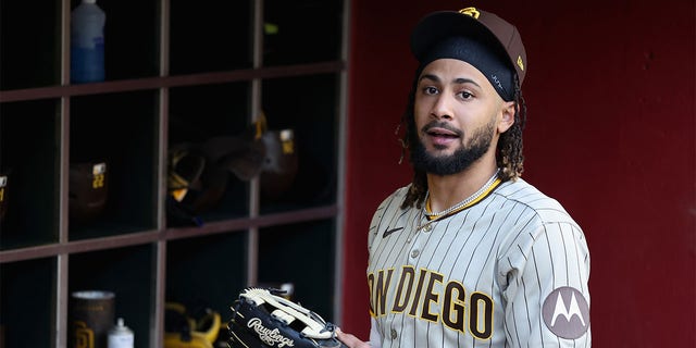 Fernando Tatis Jr. in the Padres dugout