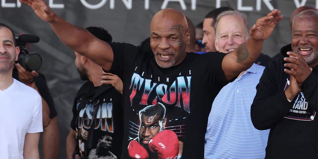 Mike Tyson acknowledges the crowd