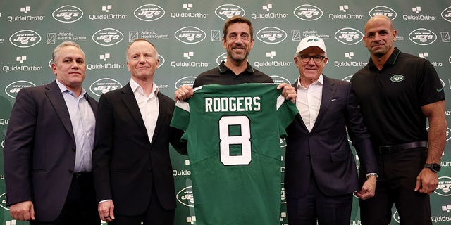 Jets ownership poses for a picture