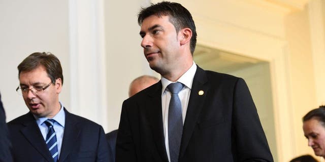 Romania's Foreign Minister Dragos Tudorache walks after a meeting on the Balkan migrant route into the EU in Vienna on Sept. 24, 2016.