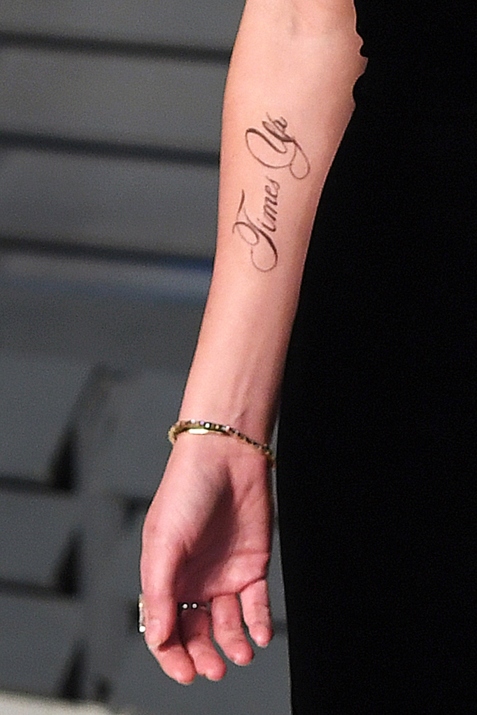 A tattoo supporting the 'Time's Up' campaign on the arm of Emma Watson as she arrives at the Vanity Fair Oscar Party held in Beverly Hills, Los Angeles, USA. (Photo by PA/PA Images via Getty Images)
