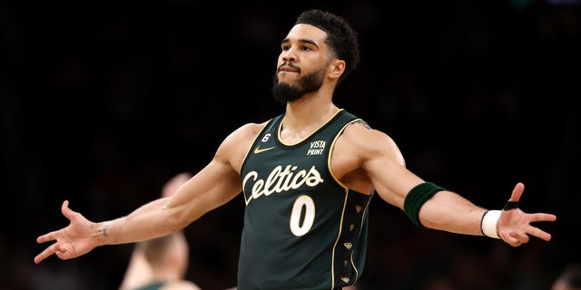Jayson Tatum of the Boston Celtics celebrates during the second quarter of Game 1 of a first-round playoff series against the Atlanta Hawks at TD Garden April 15, 2023, in Boston.