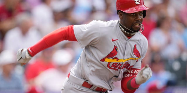 St. Louis Cardinals' Jordan Walker races up the first-base line after hitting a single off Colorado Rockies relief pitcher Connor Seabold, Wednesday, April 12, 2023, in Denver.