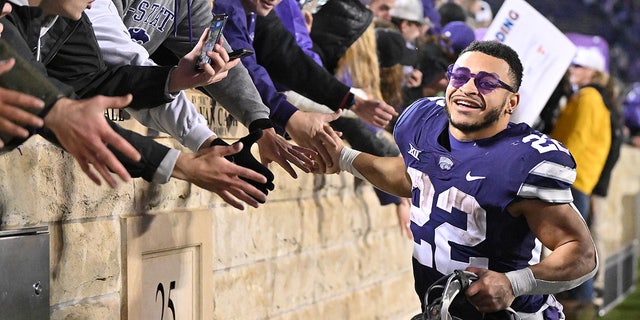 Deuce Vaughn celebrates after winning a game