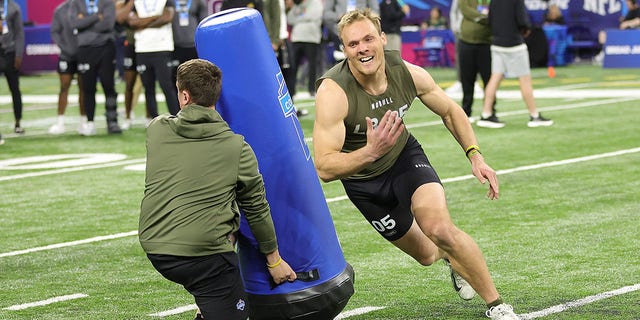 Linebacker Jack Campbell goes through drills 