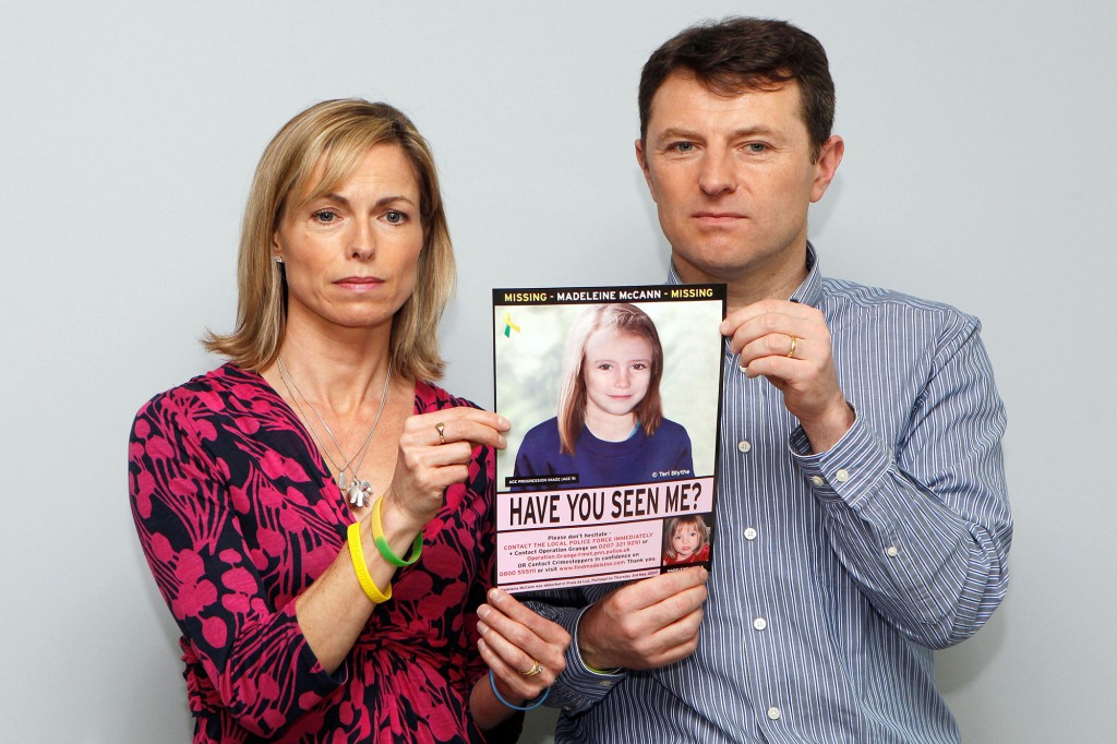 Kate and Gerry McCann pose with a computer generated image of how their missing daughter Madeleine might look now, during a news conference in London May 2, 2012. 