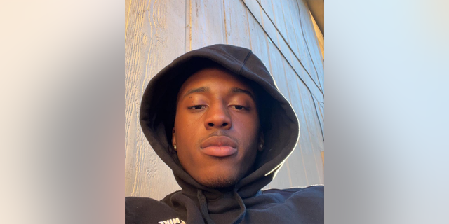 Photo of Marsiah Emmanuel Collins seen in a black hoodie