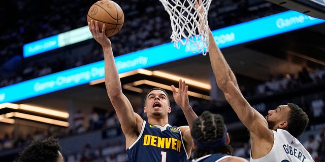 Michael Porter Jr drives to the basket