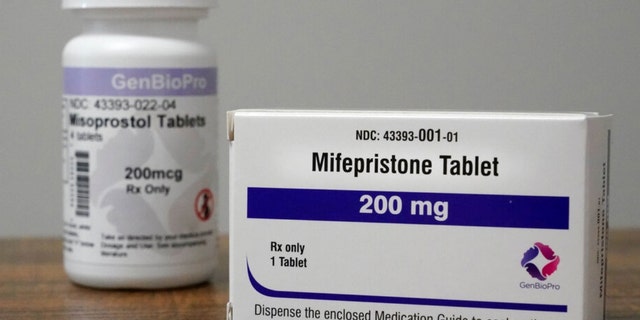 Containers of the medication used to end an early pregnancy sit on a table inside a Planned Parenthood clinic, Oct. 29, 2021, in Fairview Heights, Illinois.