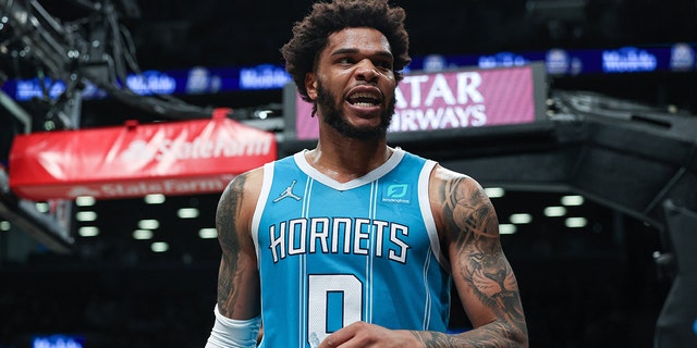 Charlotte Hornets forward Miles Bridges (0) reacts after being fouled during the first half against the Brooklyn Nets at Barclays Center in Brooklyn, N.Y., March 27, 2022.