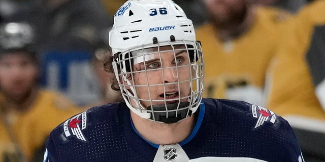 Winnipeg Jets center Morgan Barron, #36, plays with a bandage against the Vegas Golden Knights during the second period of Game 1 of an NHL hockey Stanley Cup first-round playoff series Tuesday, April 18, 2023, in Las Vegas.