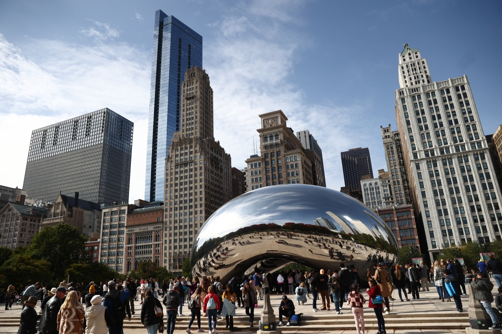 View of the Cloud Gate sculpture in the Millenium Park and buildings in Chicago, United States on October 14, 2022.