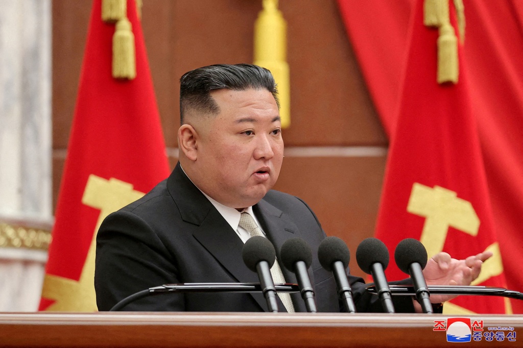 North Korean leader Kim Jong Un attends the 7th enlarged plenary meeting of the 8th Central Committee
