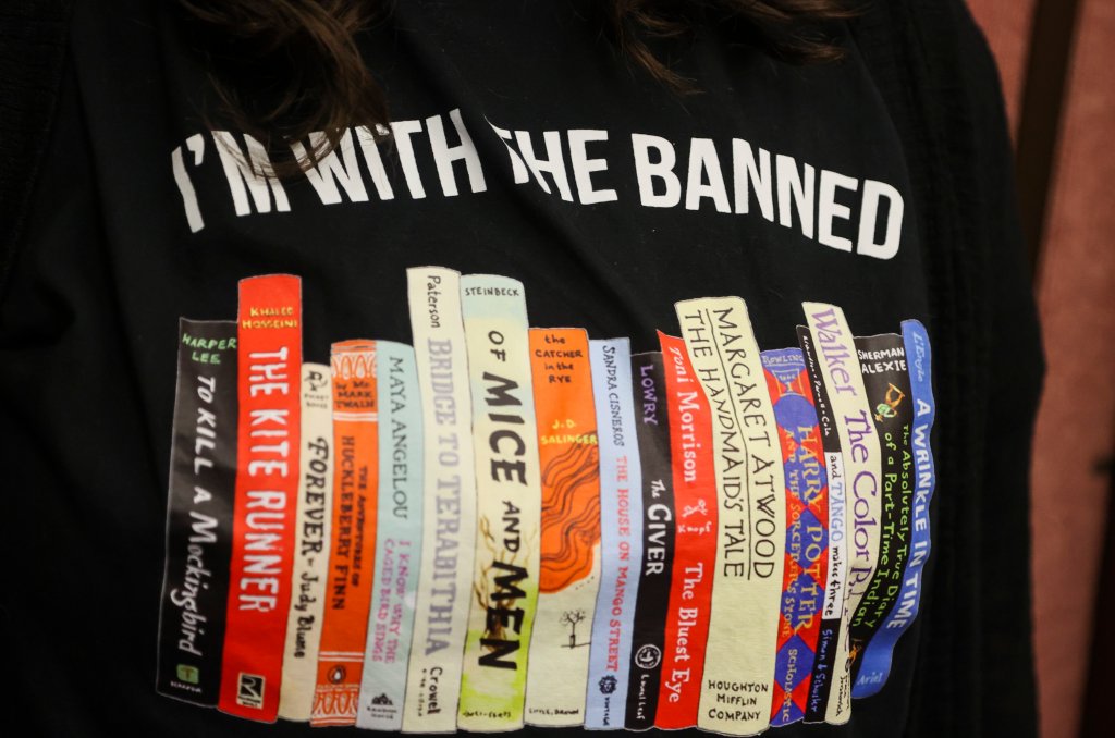 Jennifer Wilson, a Largo High School English teacher, wears a shirt against banning books at the Pinellas County School Board meeting in Largo, Fla., Feb. 14, 2023. 