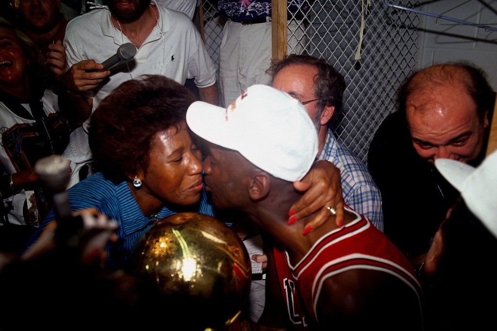 Jordan celebrates with his mother in 1991 after winning the NBA championship.