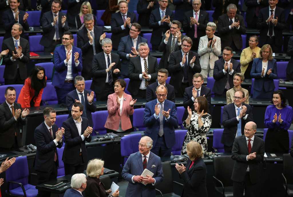 Britain's King Charles III (front C) receives applause from members of parliament after delivering a speech at the Bundestag (lower house of parliament) in Berlin, on March 30, 2023. - Britain's Charles III is on a three-day tour in Germany for his first state visit as king, with the trip billed as "an important European gesture" to maintain strong ties after Brexit. (Photo by Ronny HARTMANN / AFP) (Photo by RONNY HARTMANN/AFP via Getty Images)
