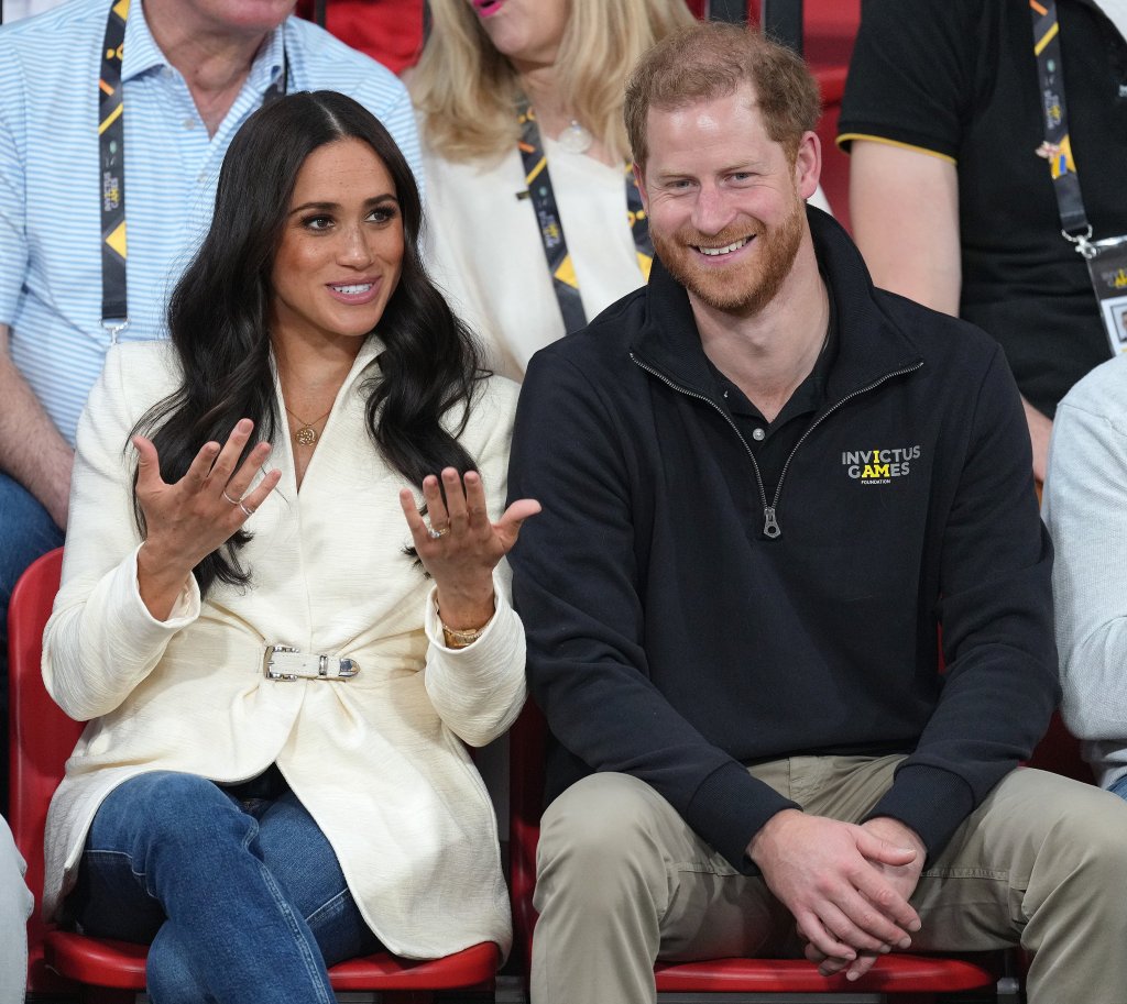 Meghan and Harry watch the Invictus Games last April.