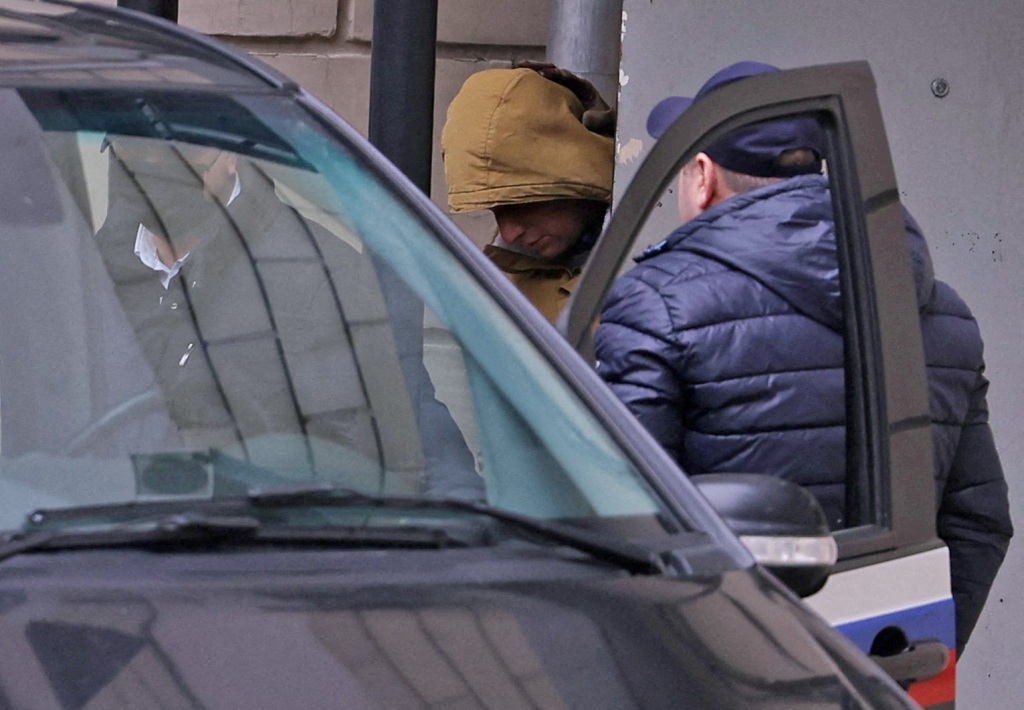 Gershkovich leaving a court building in Moscow in police custody on March 30, 2023.