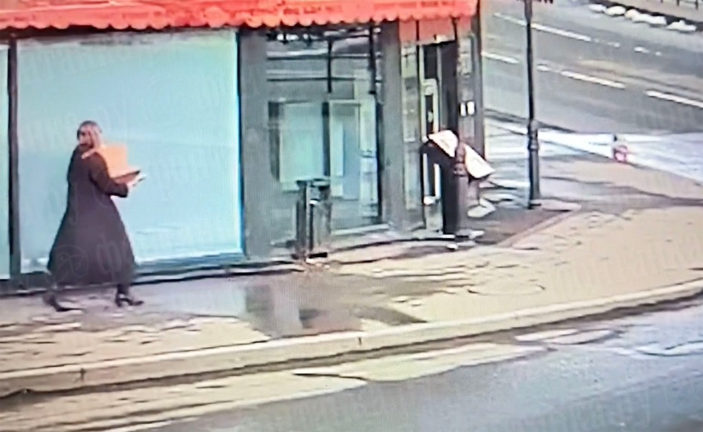 Surveillance video shows a woman believe to be Trepova carrying a box containing a figurine laden with explosives for Street Food Bar No. 1 Sunday evening. 