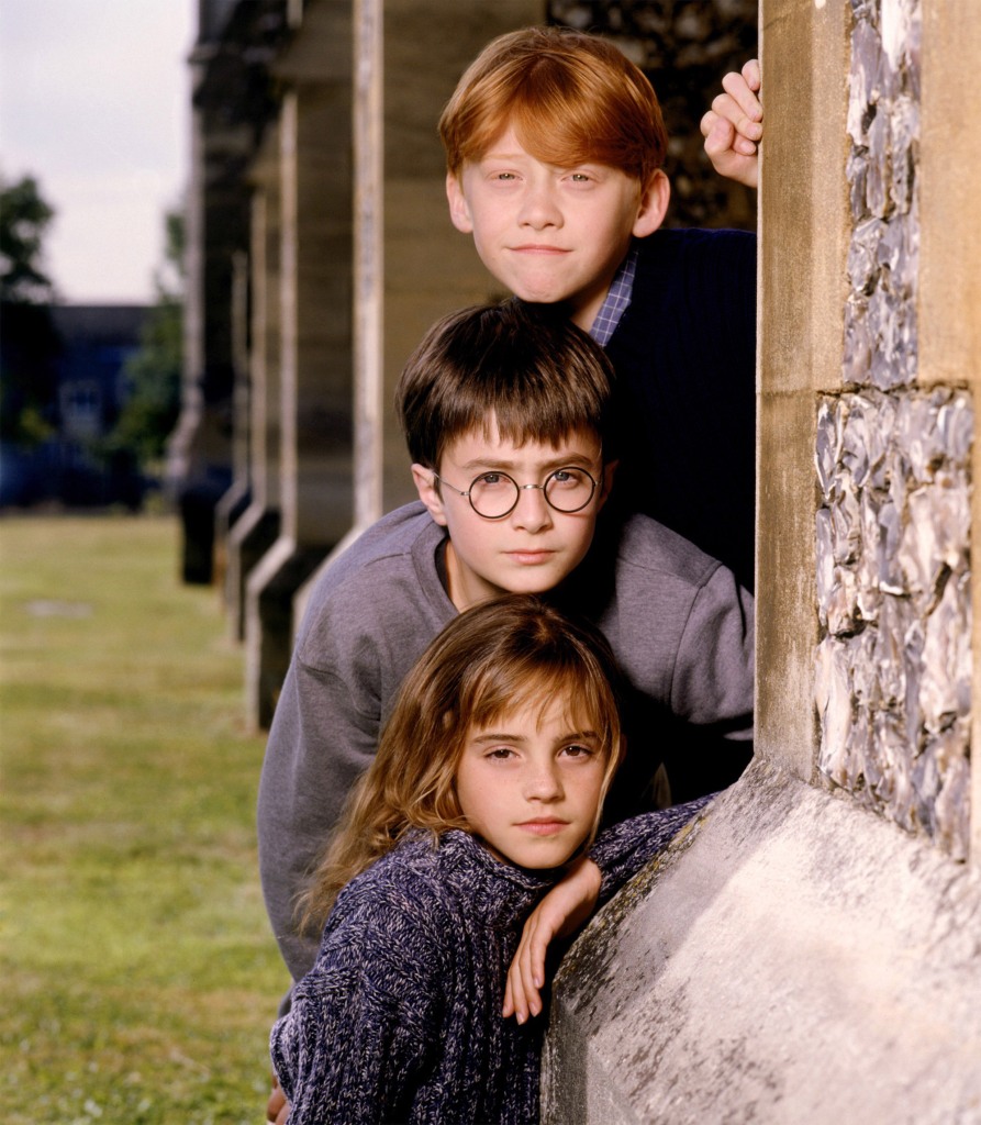 HARRY POTTER AND THE SORCERER'S STONE, from top: Rupert Grint, Daniel Radcliffe, Emma Watson, 2001
