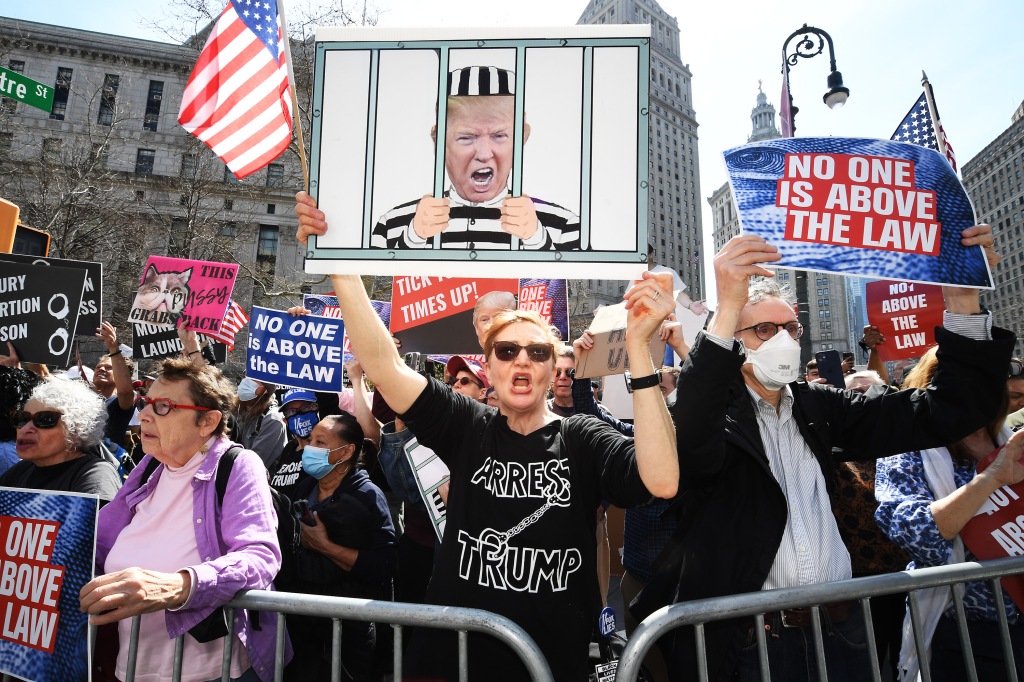 Protestors flooded the streets of Manhattan during Trump's court appearance Tuesday.