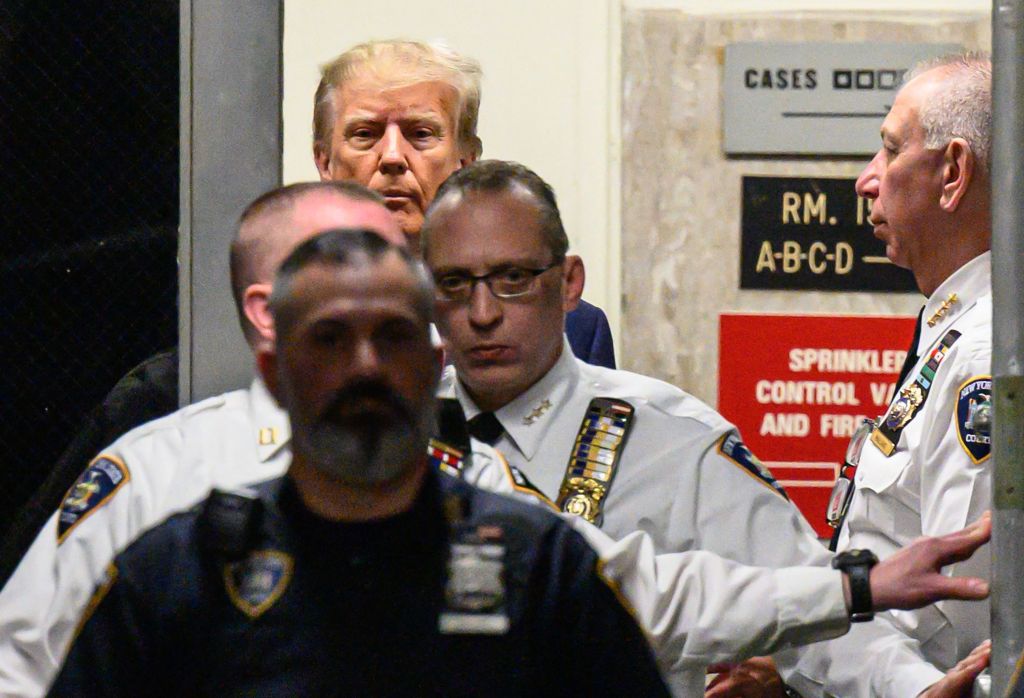 Former President Donald Trump arrives in Manhattan Criminal Court for his arraignment Tuesday, April 4, 2023. 