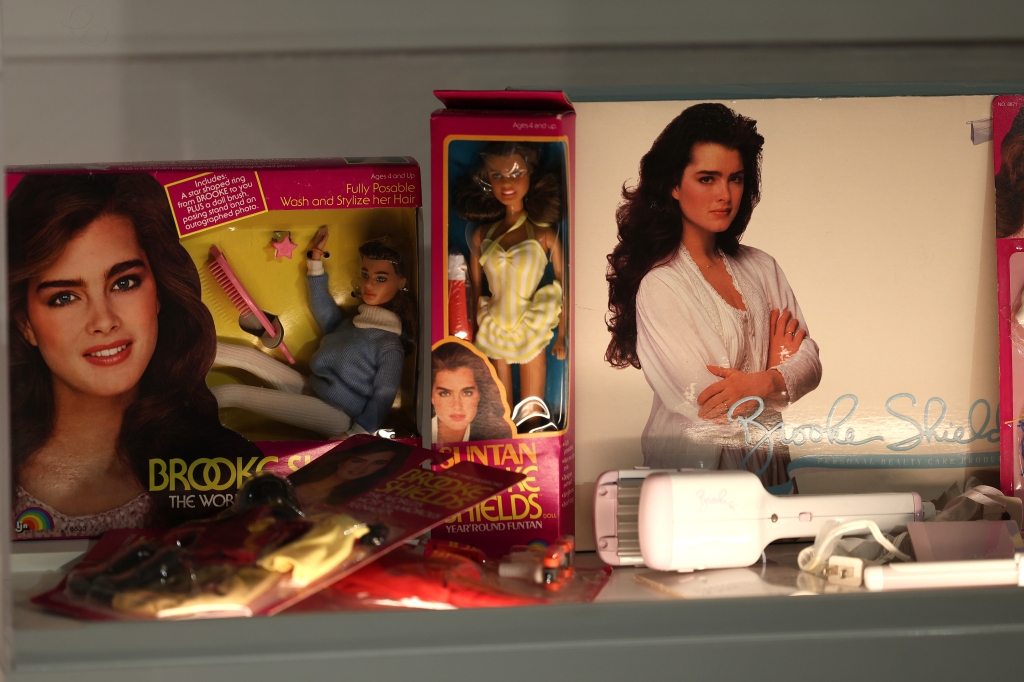 Magazine covers, dolls, and posters of Brooke Shields. 