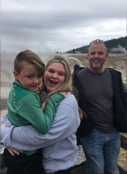 JJ Vallow and his sister, Tylee Ryan, pose at Yellowstone National Park with their uncle, Alex Cox.