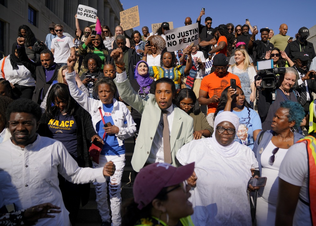 Jones at a rally outside of the Historic Metro Courthouse after being reinstated.