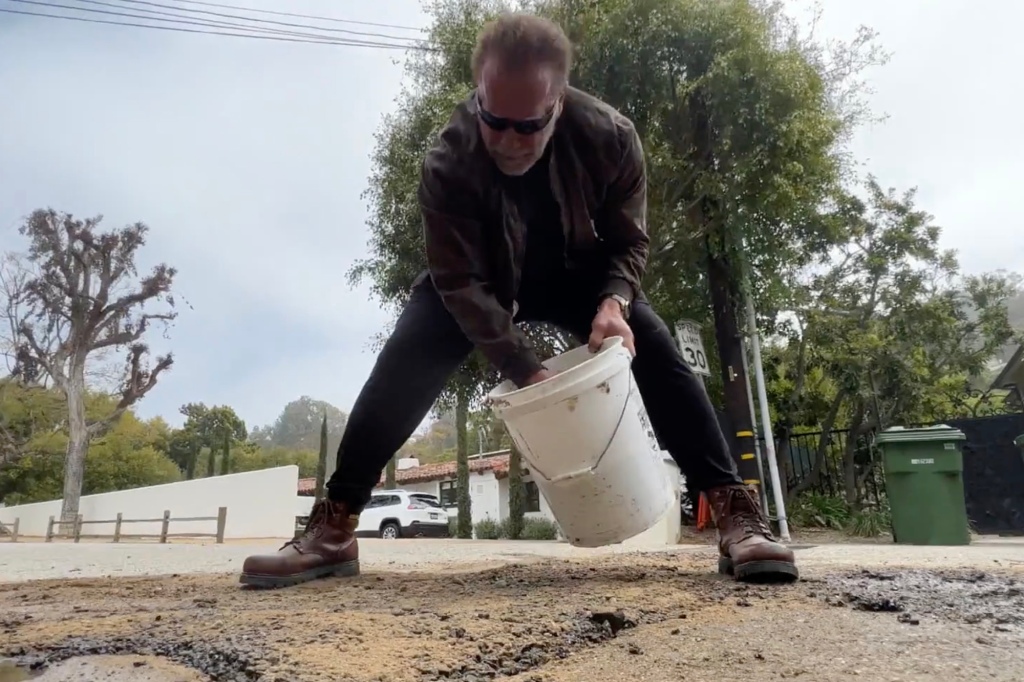 Arnold Schwarzenegger fixes the pothole.