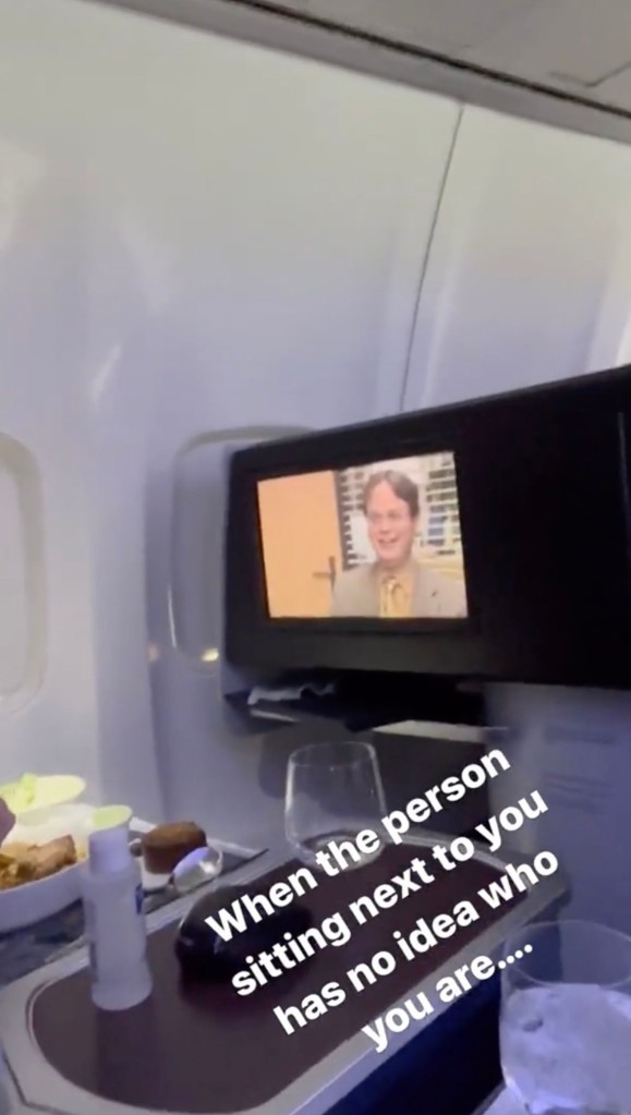 Passenger watching "The Office"