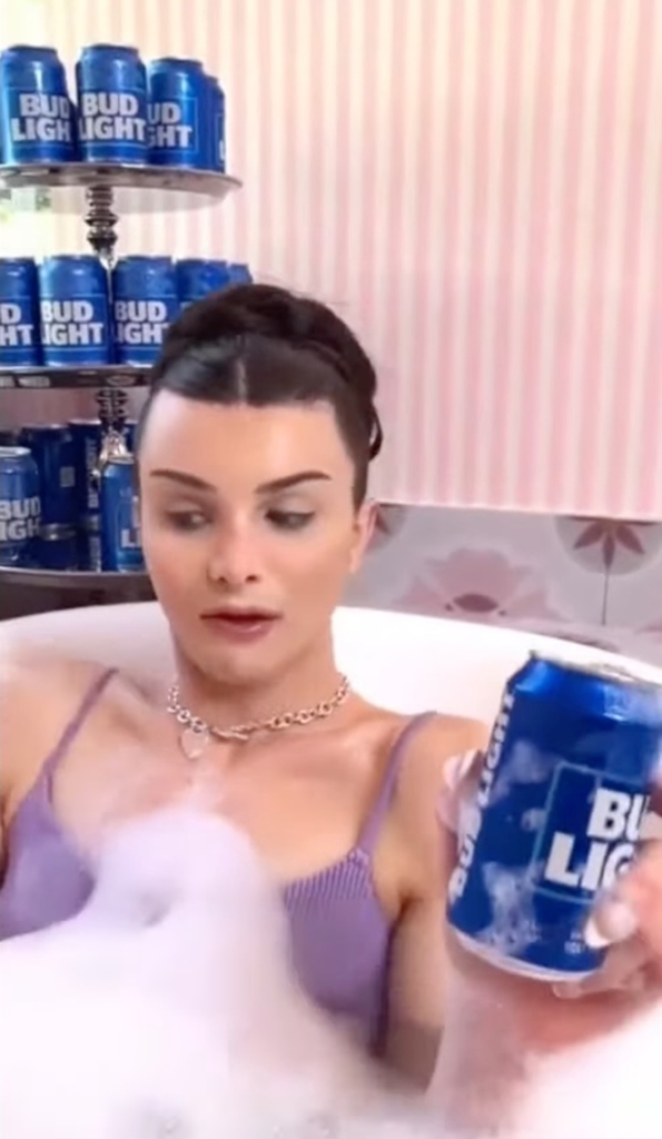 Transgender influencer Dylan Mulvaney showed off Bud Light while in a bathtub.  