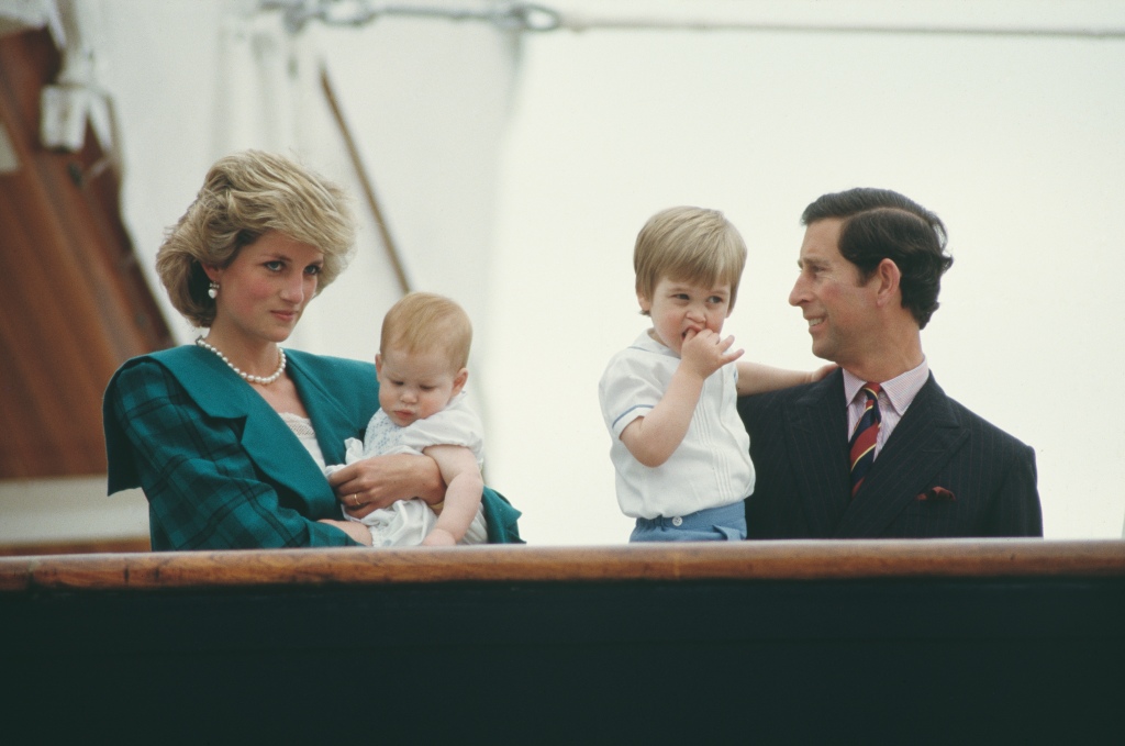 Charles and Diana, Princess of Wales (1961 - 1997) on the royal yacht 'Britannia' with their sons William and Harry during a visit to Venice, Italy, April 1985.  