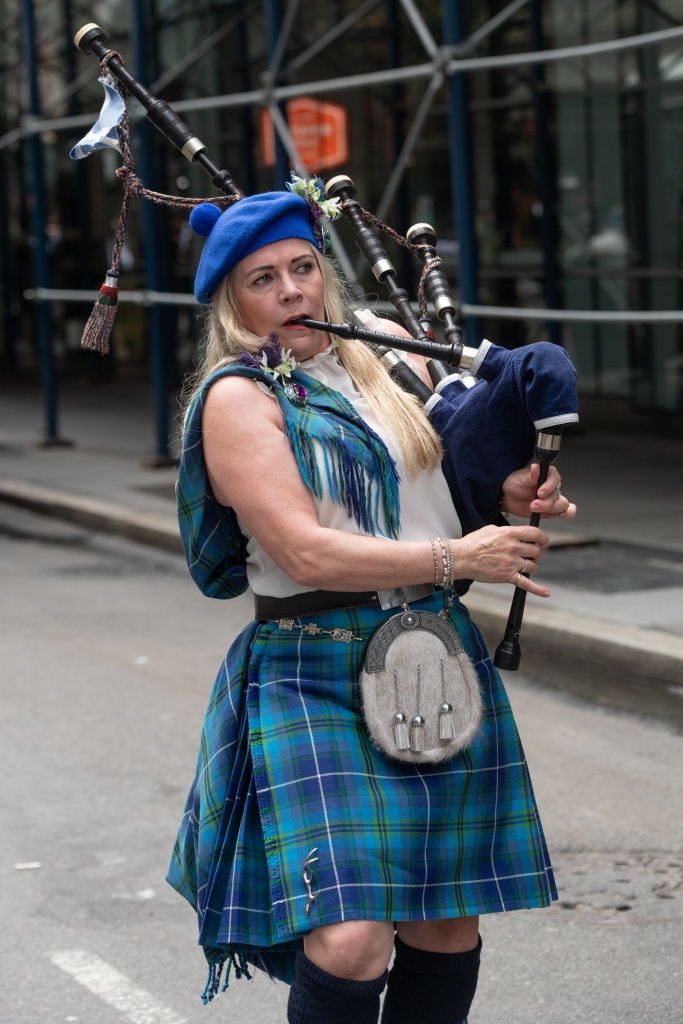 Woman playing bagpipes