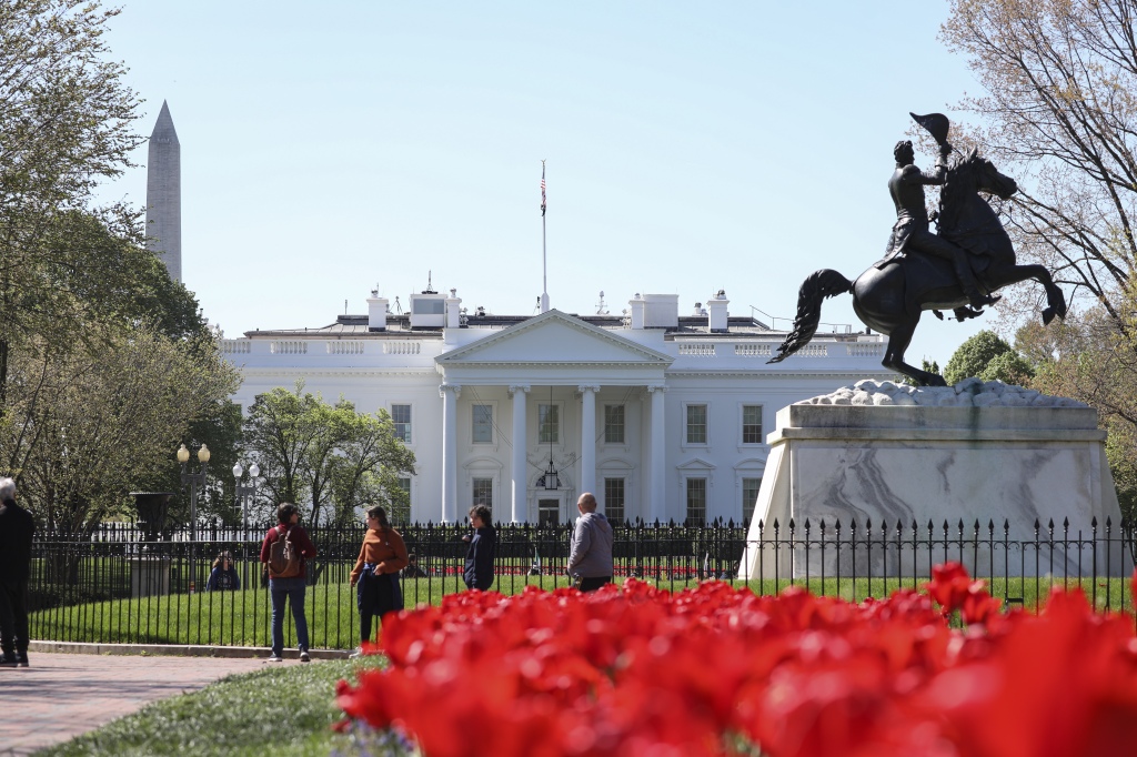 WASHINGTON DC, UNITED STATES - APRIL 10: A view of tulips at Lafayette Square as the White House is seen behind in Washington, DC, United States on April 10, 2023. (Photo by Celal Gunes/Anadolu Agency via Getty Images)