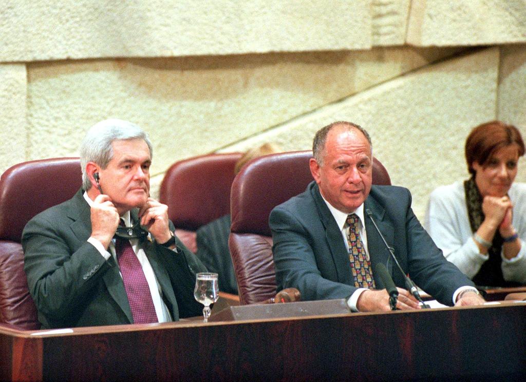 US House Speaker Newt Gingrich (L) sits next to his Israeli counterpart Dan Tichon before he delivered a speech to the Israeli parliament, or Knesset, in Jerusalem, May 26, 1998.