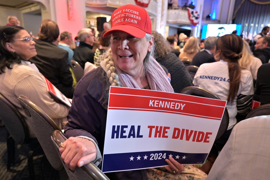 Jean Tobin of Islandia, N.Y.,  waits for Robert F. Kennedy Jr. to speak.