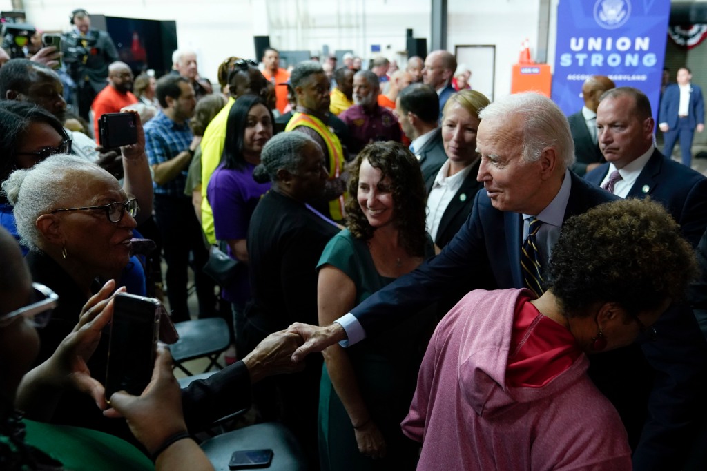 Biden shaking hands with people after his speech about his economic agenda.
