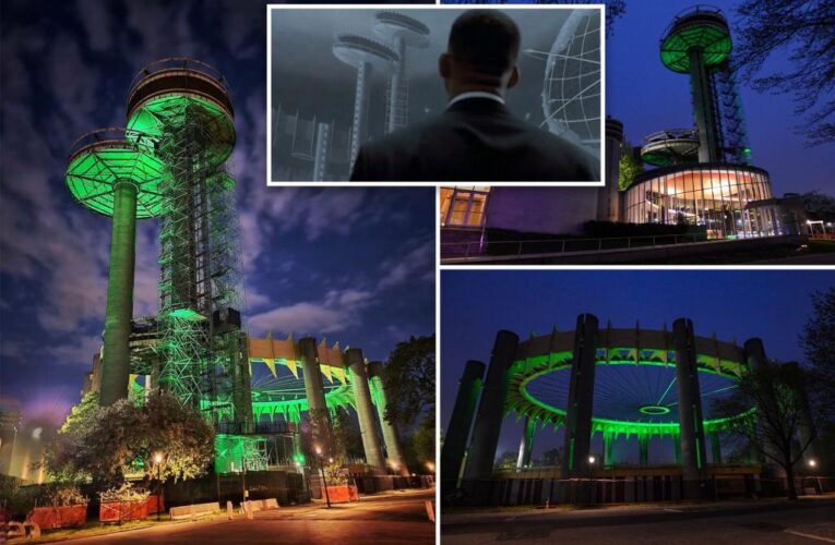 Iconic ‘Men in Black’ towers light up once again in Queens