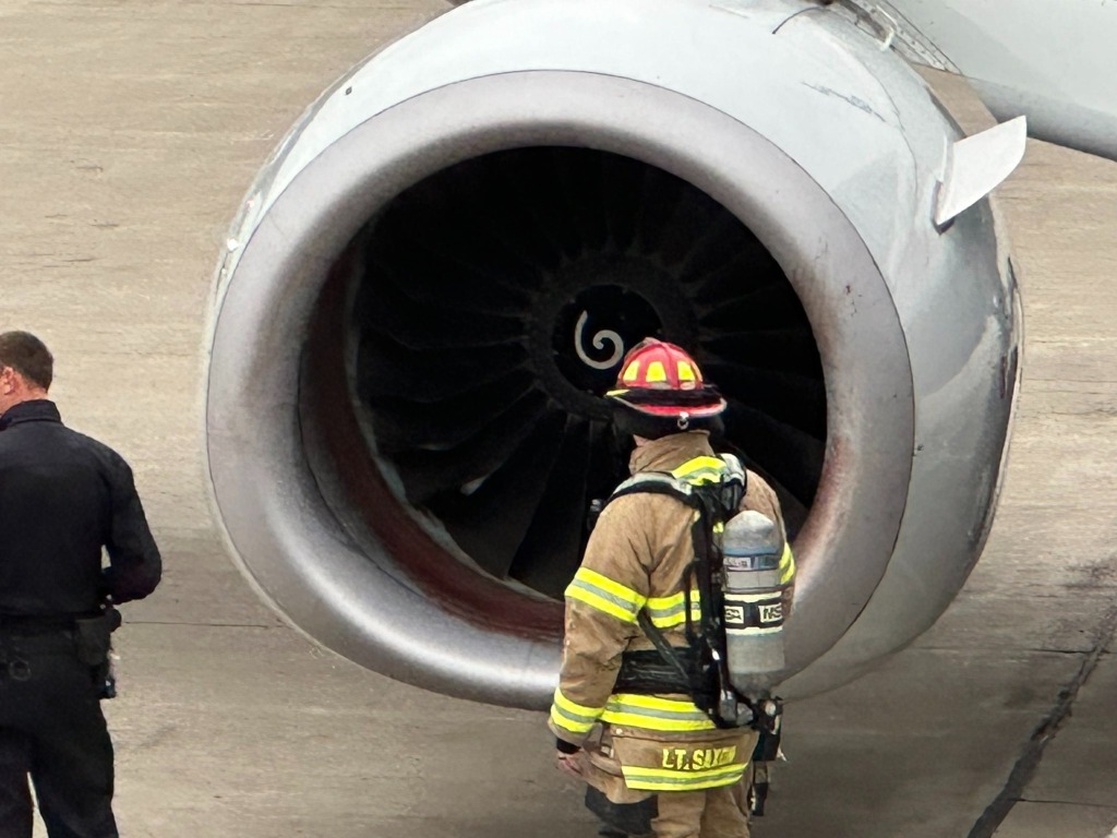 Firefighters and airport security put out the engine fire and inspected the airplane