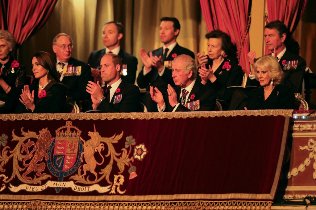 Kate Middleton, Prince William, Prince Charles and Camilla Parker-Bowles seated in a royal theater box