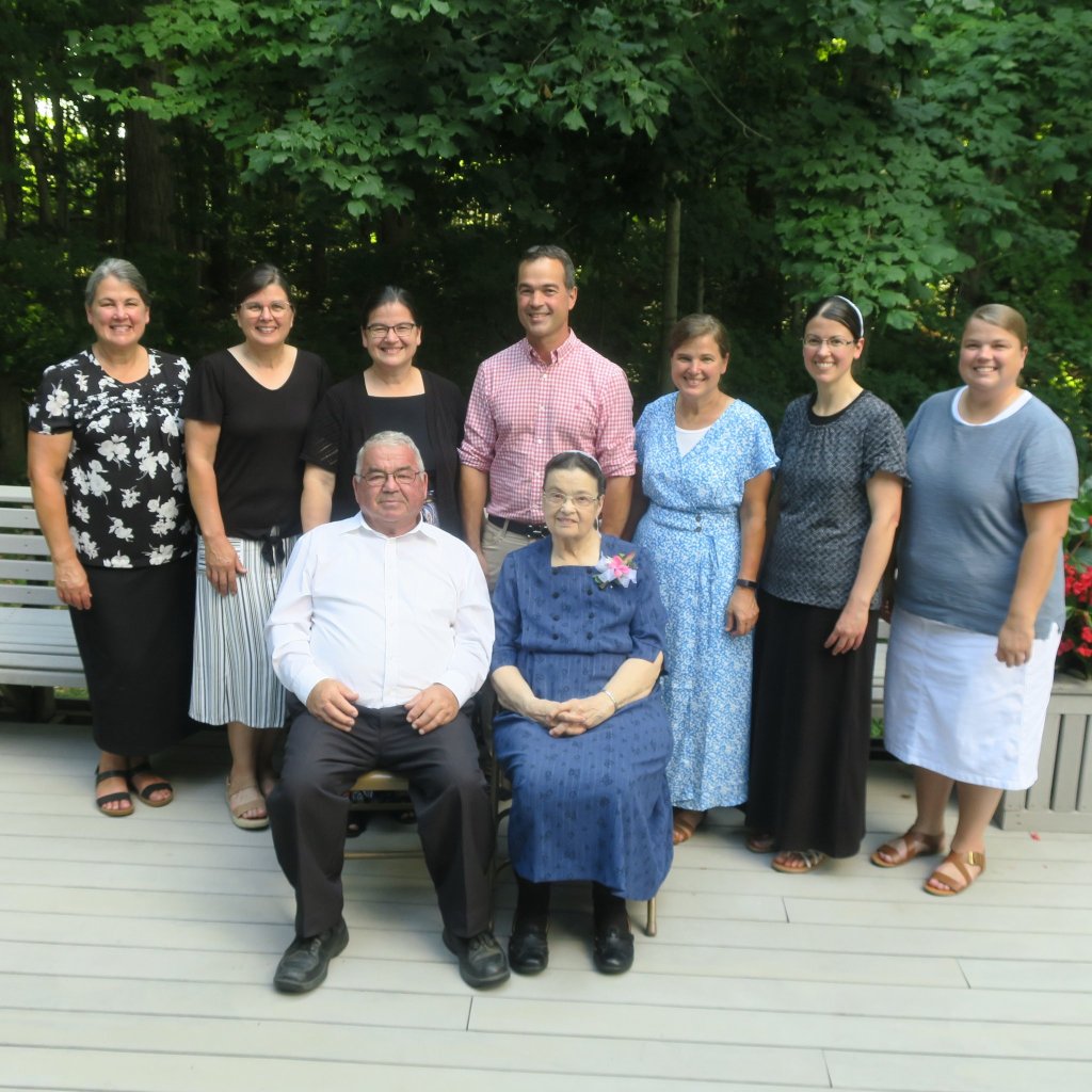 Devon Hoover with his six sisters and elderly parents.