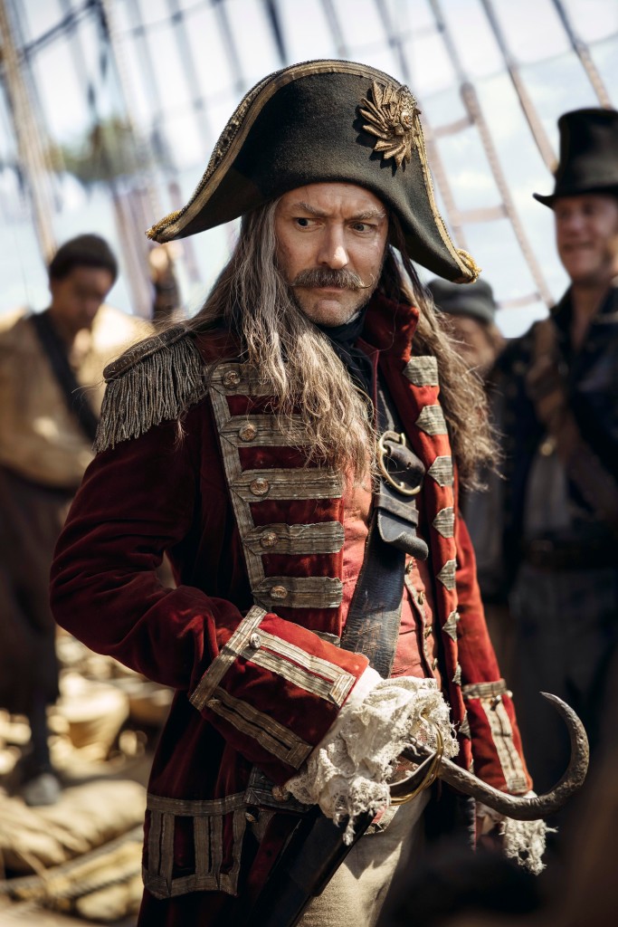 Jude Law dressed up in pirate costume.