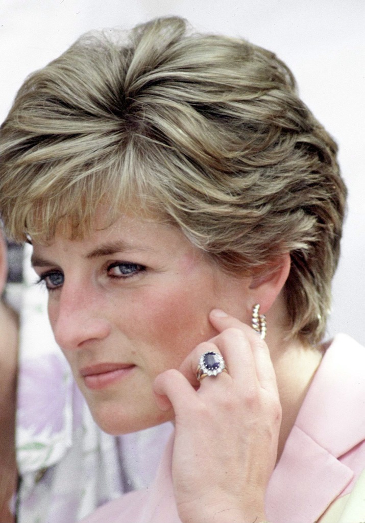 Diana is seen wearing the iconic 12-carat blue sapphire engagement ring prior to her death.